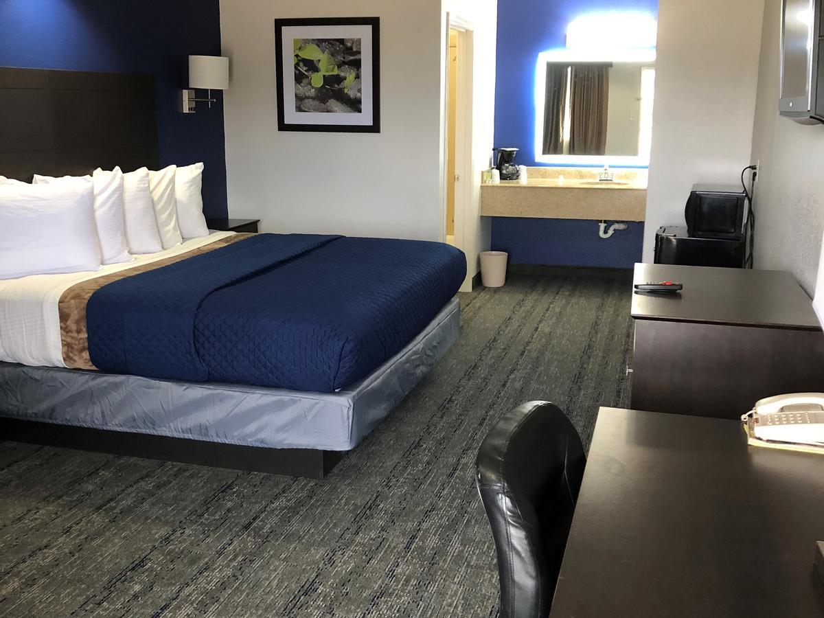 Executive Inn And Suites Joaquin Eksteriør bilde
