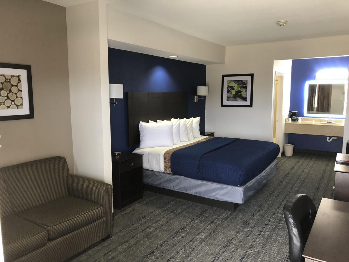 Executive Inn And Suites Joaquin Eksteriør bilde