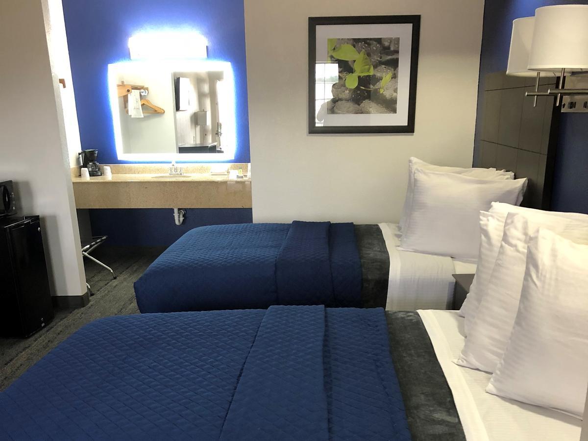 Executive Inn And Suites Joaquin Eksteriør bilde